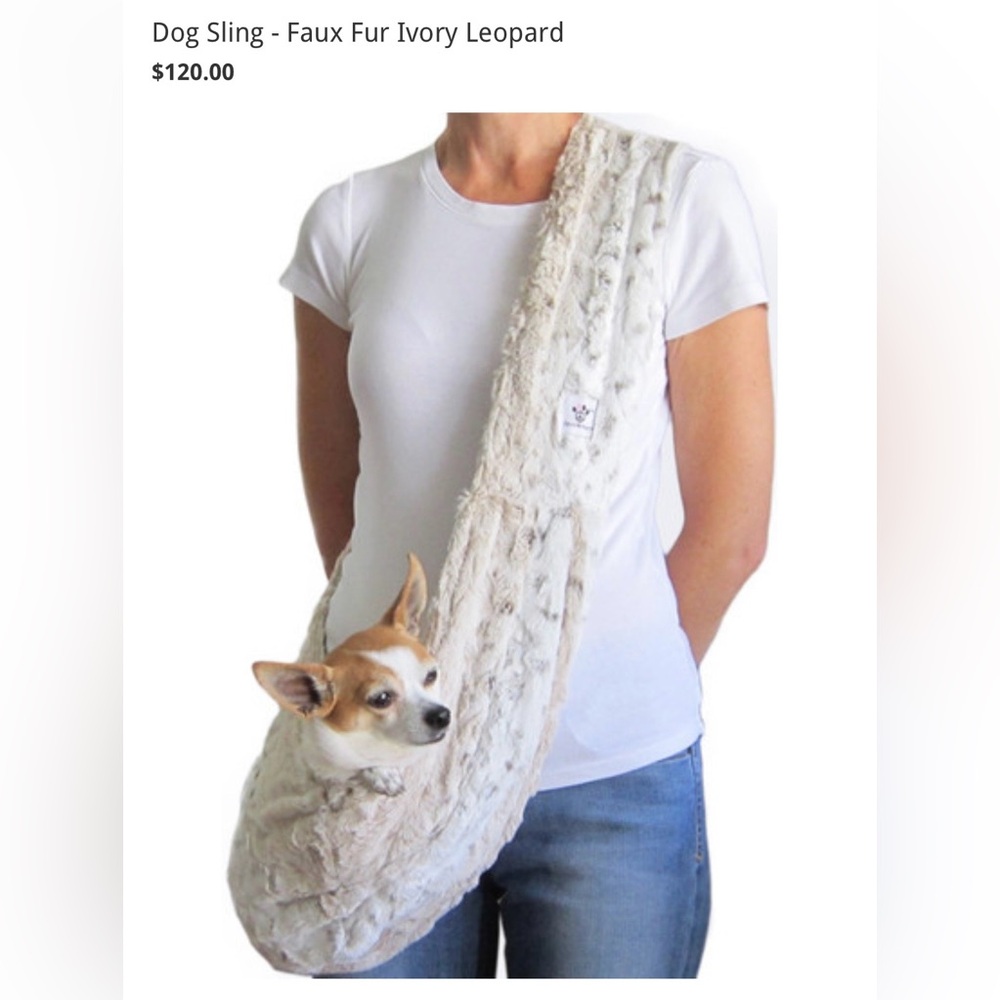 Faux fur dog sling.Pocket inside , Fur inside and out, outgrew b4 could use